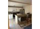 Open concept kitchen features stainless steel appliances, breakfast bar at 5334 Bamboo Ct # 463, Orlando, FL 32811