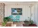 Inviting front porch with seating area and decorative planters at 5441 Justine Way, Winter Park, FL 32792