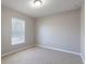 Bedroom with carpeted floor, neutral walls, and natural light at 5565 Gelato Dr, Orlando, FL 32829