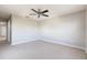 Spacious room with carpeting and neutral walls. Ready to be transformed into your ideal living space at 5565 Gelato Dr, Orlando, FL 32829