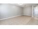 Neutral living room with ceramic tile flooring and ample space, ready for customization at 5565 Gelato Dr, Orlando, FL 32829