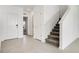Open foyer with tile floors, stairs and neutral walls at 640 Trotters Dr, Eagle Lake, FL 33839