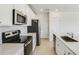Beautiful, bright kitchen featuring stainless steel appliances, a center island, and ample counter space at 640 Trotters Dr, Eagle Lake, FL 33839