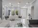 Open living space featuring living and dining areas with white marble floors and light gray walls at 6607 Whispering Pines Rd, Orlando, FL 32824