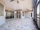 Expansive screened patio provides seamless indoor-outdoor living space with ample natural light at 6607 Whispering Pines Rd, Orlando, FL 32824