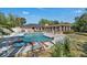 Lush backyard featuring a beautiful pool and patio, perfect for outdoor entertaining at 8720 Larwin Ln, Orlando, FL 32817