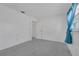 Bright bedroom featuring modern floors and ample natural light from the window at 8720 Larwin Ln, Orlando, FL 32817