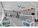 Bright living room featuring a wet bar, tile floors, and plenty of natural light at 8720 Larwin Ln, Orlando, FL 32817