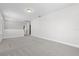 Spacious bonus room with plush carpeting and ample natural light at 9687 Lost Creek Dr, Winter Garden, FL 34787