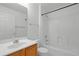 Bathroom featuring a white tub-shower combination, and oak vanity at 150 Golfside Cir, Sanford, FL 32773