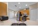 Open kitchen area showcasing stainless steel appliances and ample cabinet space at 150 Golfside Cir, Sanford, FL 32773