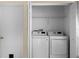 Inside laundry area featuring modern washer and dryer units with room for storage at 150 Golfside Cir, Sanford, FL 32773