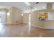 Spacious living room with hardwood floors, natural light, and open layout to the kitchen at 150 Golfside Cir, Sanford, FL 32773