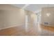 Bright living room with hardwood floors, neutral walls, and a decorative chandelier at 150 Golfside Cir, Sanford, FL 32773