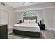 Cozy bedroom featuring a comfortable bed, stylish furniture, and serene decor for a relaxing retreat at 14501 Grove Resort Ave # 3222, Winter Garden, FL 34787