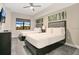 Comfortable bedroom featuring two beds, stylish furniture, and serene decor for a relaxing retreat at 14501 Grove Resort Ave # 3222, Winter Garden, FL 34787