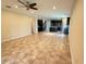 Open concept space showcases the integration of the kitchen and spacious living room at 2815 Moonstone Bnd, Kissimmee, FL 34758