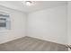 This carpeted bedroom is bright and well lit with neutral walls and a window at 3218 Viceroy Ct, Poinciana, FL 34759