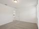 Bedroom with plush carpeting, light-filled interiors, and ensuite access at 3218 Viceroy Ct, Poinciana, FL 34759