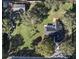 Aerial view showcasing the property's layout, landscaping, and surrounding neighborhood at 4570 Chambliss Rd, Winter Haven, FL 33884