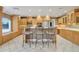 Kitchen with stainless steel appliances, breakfast bar, lots of storage, and recessed lighting at 4570 Chambliss Rd, Winter Haven, FL 33884
