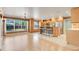 Open floor plan featuring stainless steel appliances, breakfast bar, and plenty of natural light at 4570 Chambliss Rd, Winter Haven, FL 33884