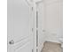 Clean powder room with hard surface floors and modern fixtures at 836 Poppy Ln, Dundee, FL 33838