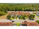 Aerial view of home with red location marker on the roof at 8944 Sugar Palm Rd, Kissimmee, FL 34747