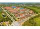 Sprawling community with vibrant homes, lush landscaping, and convenient access to nearby roads and neighborhood amenities at 8944 Sugar Palm Rd, Kissimmee, FL 34747