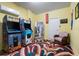 Arcade room features multiple arcade games and decor, offering a playful entertainment space at 8944 Sugar Palm Rd, Kissimmee, FL 34747