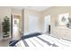 Cozy bedroom featuring a blue accent rug and lots of natural light at 9254 Reymont St, Orlando, FL 32827
