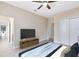 Bedroom with a ceiling fan, closet and natural light at 9254 Reymont St, Orlando, FL 32827