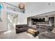 Open concept living room featuring an eat in kitchen, high ceilings and modern decor at 9254 Reymont St, Orlando, FL 32827