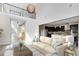 Open-concept living space seamlessly connecting the living room and modern kitchen, great for entertaining at 9254 Reymont St, Orlando, FL 32827