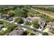 Residential street near golf course and lush landscaping for a serene neighborhood view at 9826 Heron Pointe Dr, Orlando, FL 32832
