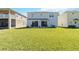 Extensive backyard with lush lawn, perfect for outdoor activities and relaxation at 9826 Heron Pointe Dr, Orlando, FL 32832