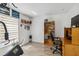 Office space with desk, storage, and ample natural light at 9826 Heron Pointe Dr, Orlando, FL 32832