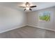 Comfortable bedroom featuring neutral carpeting and a window with natural light at 1197 Tallow Rd, Apopka, FL 32703