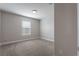 Cozy bedroom featuring neutral carpeting, a bright window, and fresh paint at 1197 Tallow Rd, Apopka, FL 32703