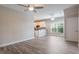 Open-concept living space featuring tile floors and seamless flow into the kitchen at 1197 Tallow Rd, Apopka, FL 32703