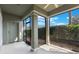 Screened patio with tiled flooring, neutral walls, a door, and a pleasant outdoor view at 1197 Tallow Rd, Apopka, FL 32703