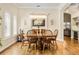 Elegant dining room featuring a crystal chandelier and comfortable seating at 1638 Swallowtail Ln, Sanford, FL 32771