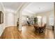 Open-concept living room and dining area with natural light and hardwood floors at 1638 Swallowtail Ln, Sanford, FL 32771