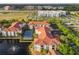 Aerial view of the building with tennis court and pond at 2615 Maitland Crossing Way # 9 307, Orlando, FL 32810