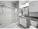 Bright bathroom featuring a shower and tub combination, granite counters, and ample storage space at 2615 Maitland Crossing Way # 9 307, Orlando, FL 32810