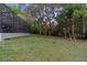 Spacious backyard with plenty of trees and foliage, offering a private outdoor space at 305 Sweetwater Club Cir, Longwood, FL 32779