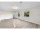 Bright bedroom features neutral walls, light wood floors and windows for natural light at 305 Sweetwater Club Cir, Longwood, FL 32779