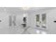 Bright foyer with marble floors, recessed lights, and stylish decor at 305 Sweetwater Club Cir, Longwood, FL 32779