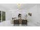 Contemporary living room with stylish seating, modern decor, and lots of natural light at 305 Sweetwater Club Cir, Longwood, FL 32779