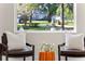 Bright seating area with a window view of the lush, landscaped yard at 305 Sweetwater Club Cir, Longwood, FL 32779